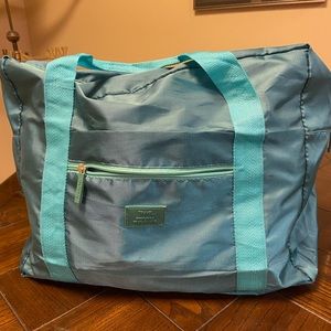 Nylon weekender or traveling bag.